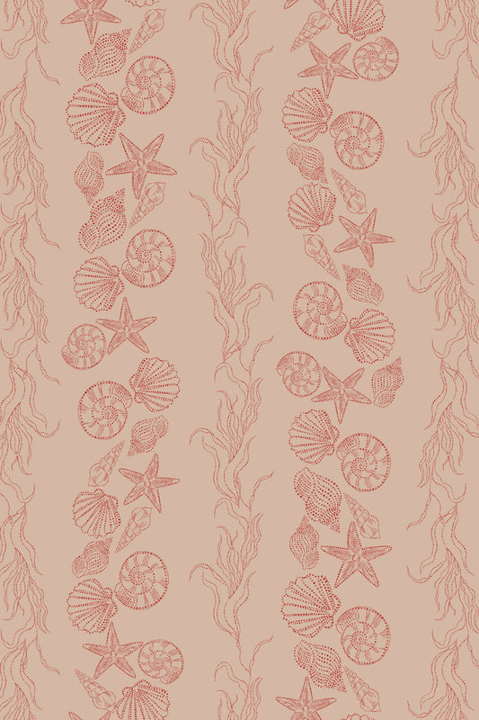 A repeating vertical pattern of seashells, starfish, and seaweed in a muted coral pink on a warm beige background.