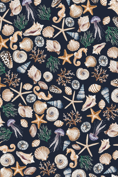 A repeating nautical pattern featuring seashells, starfish, seahorses, jellyfish, coral, and green seaweed in muted beige, tan, blue, and green tones on a dark navy background.