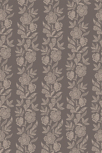 Beige wallpaper with a repeating vertical pattern of white floral vines and leaves.
