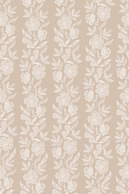 Beige wallpaper with a repeating vertical pattern of white floral vines and leaves.
