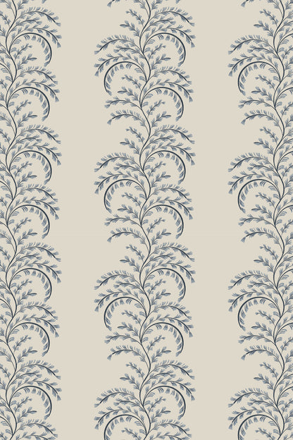 Beige wallpaper with a repeating vertical botanical scroll pattern in muted blue-gray.