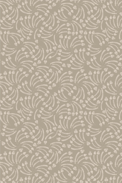 A close-up of a repeating fabric or wallpaper pattern featuring light beige floral and leaf motifs on a warm taupe-gray background.