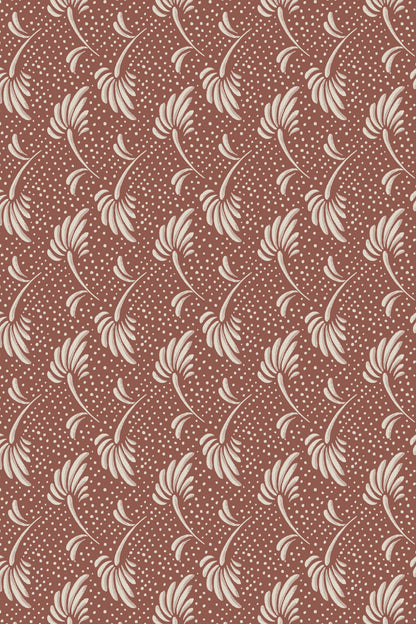 A repeating vintage-style floral pattern in cream on a warm terracotta brown background, featuring stylized leaf and vine motifs with small dots.