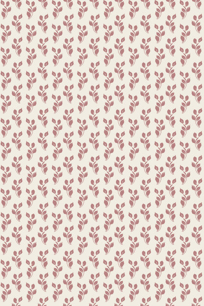 A repeating floral pattern featuring small dusty rose leafy stems on a warm cream background.