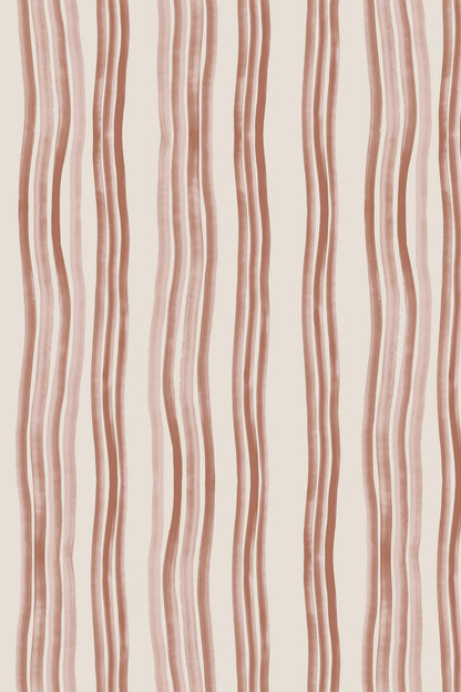A close-up of a wallpaper or fabric pattern featuring vertical wavy stripes in a muted dusty rose-brown on a warm off-white background.
