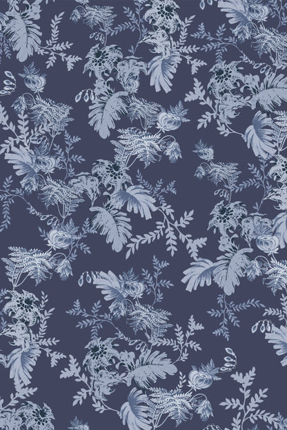 A repeating botanical toile-style pattern in pale blue and white over a dark navy background, with leaves, flowers, and vines filling the frame.