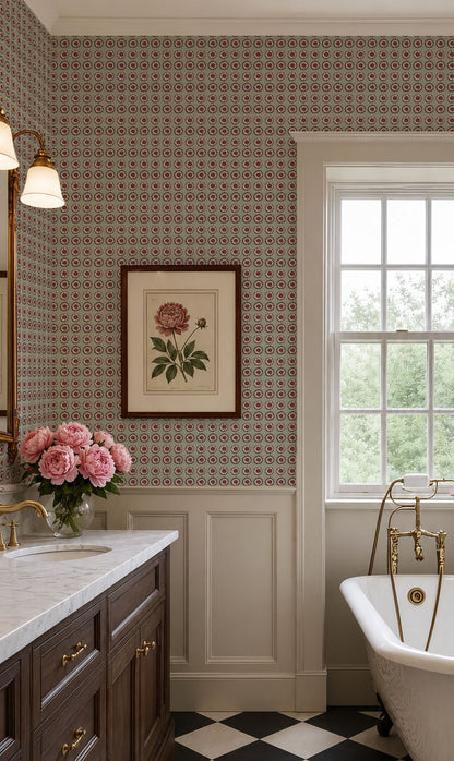 A classic bathroom interior featuring a brown and beige patterned wallpaper, white wainscoting, a dark wood vanity with gold handles, a white freestanding tub with gold fixtures, and a black-and-white checkered floor. A framed botanical print hangs on the wall.