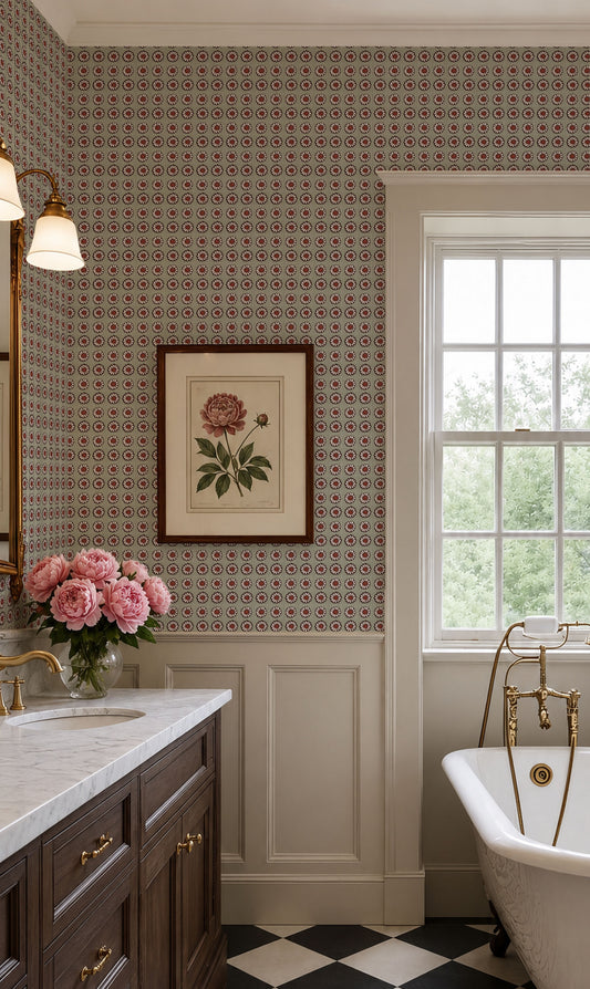 A classic bathroom interior featuring a brown and beige patterned wallpaper, white wainscoting, a dark wood vanity with gold handles, a white freestanding tub with gold fixtures, and a black-and-white checkered floor. A framed botanical print hangs on the wall.