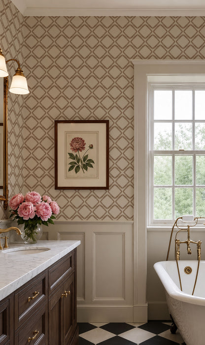 A classic bathroom interior featuring beige and brown geometric pattern wallpaper, white wainscoting, a dark wood vanity with a marble countertop, a white clawfoot tub with gold fixtures, and a black-and-white checkered floor.