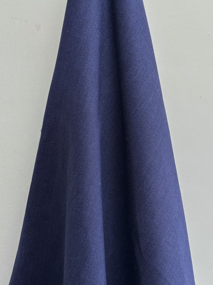 Navy blue fabric swatch on a light gray background