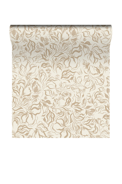 A roll of wallpaper with an elegant, repeating damask-style floral pattern in warm beige on an off-white background, shown against a plain white studio backdrop.