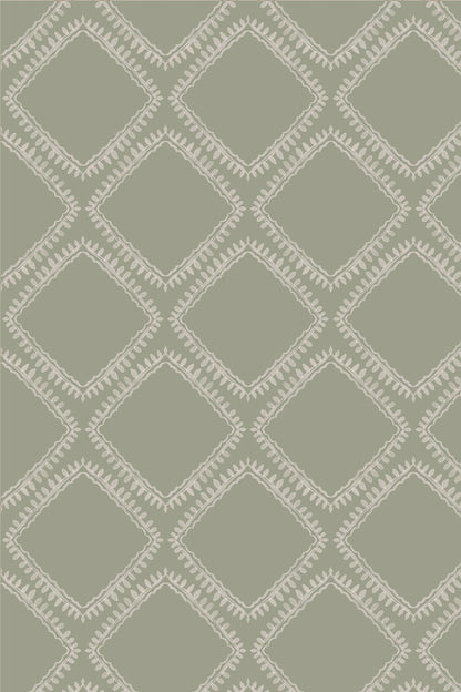 A close-up of a repeating geometric pattern featuring light beige diamond outlines and dotted border details on a muted sage green background.