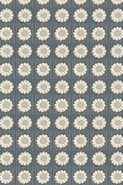A repeating fabric or wallpaper pattern featuring cream-colored daisy-like floral motifs on a muted blue-gray striped background.