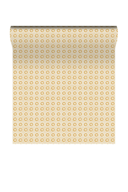 A roll of wrapping paper with a repeating pattern of small gold floral medallions on a warm cream background, shown against a plain white background.