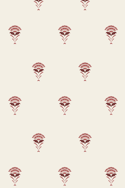 A repeating pattern of small dark red floral or fan-shaped motifs on a warm off-white background.