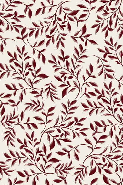 A repeating botanical pattern of dark burgundy leafy branches on a warm cream background.