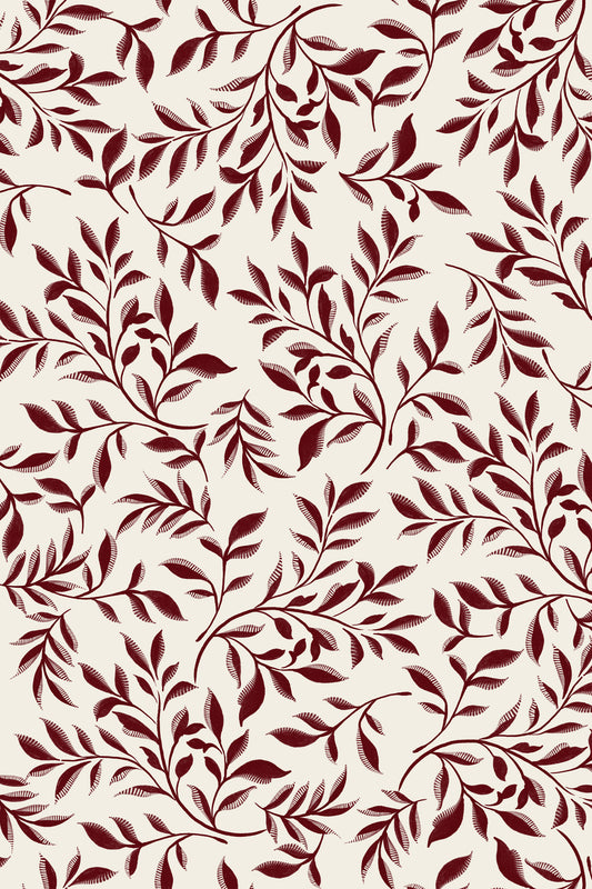 A repeating botanical pattern of dark burgundy leafy branches on a warm cream background.