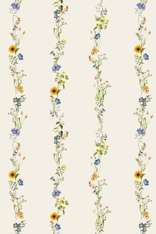 A repeating floral pattern with vertical strands of wildflowers on a warm off-white background. The flowers include yellow sunflowers, blue blossoms, and small pink and orange flowers with green stems and leaves.