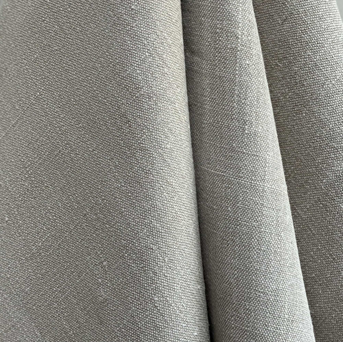Close-up of gray fabric with a subtle pattern