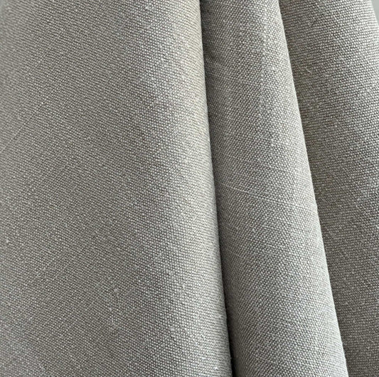 Close-up of gray fabric with a subtle pattern