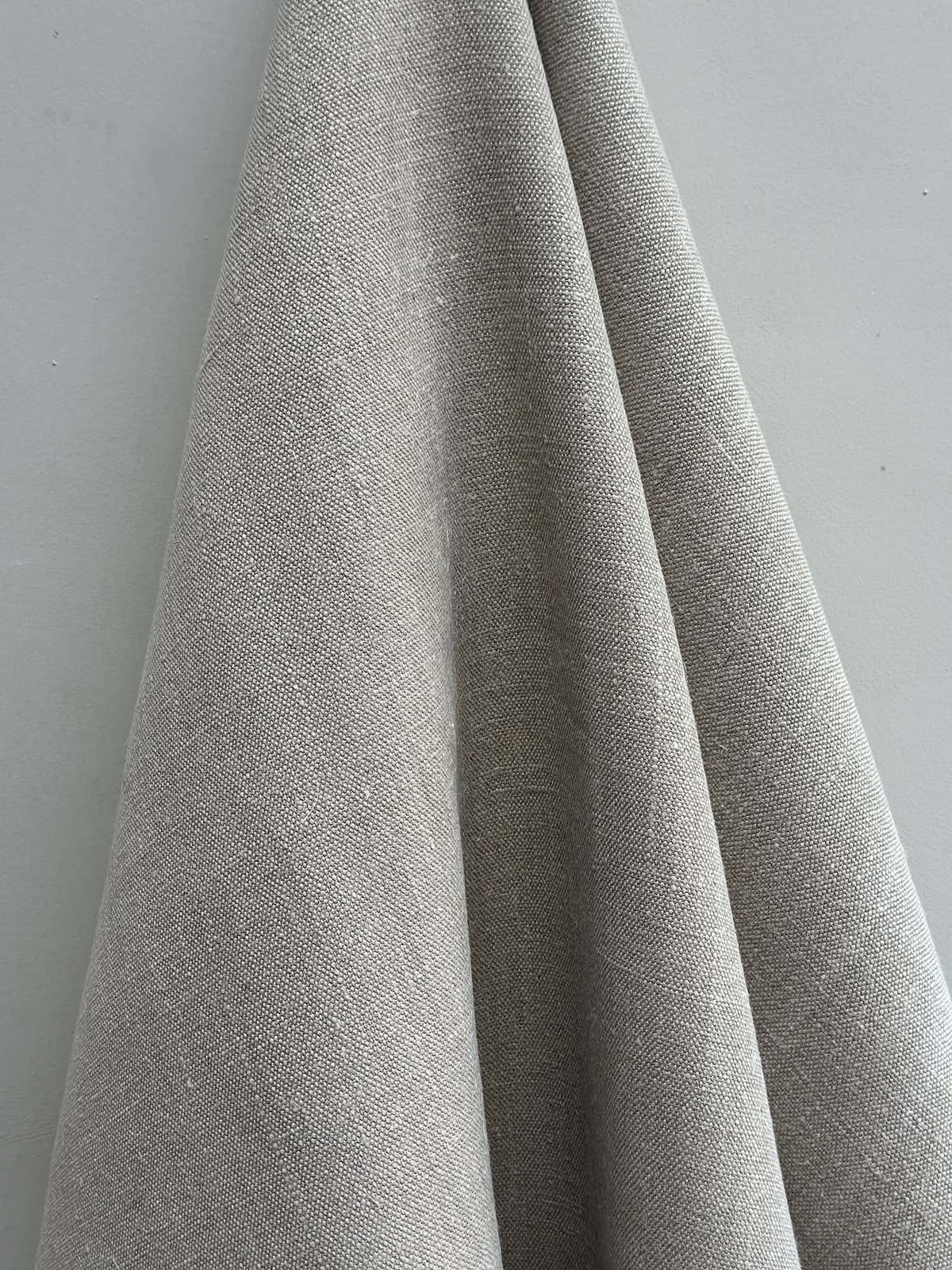 Close-up of gray fabric on a light gray background
